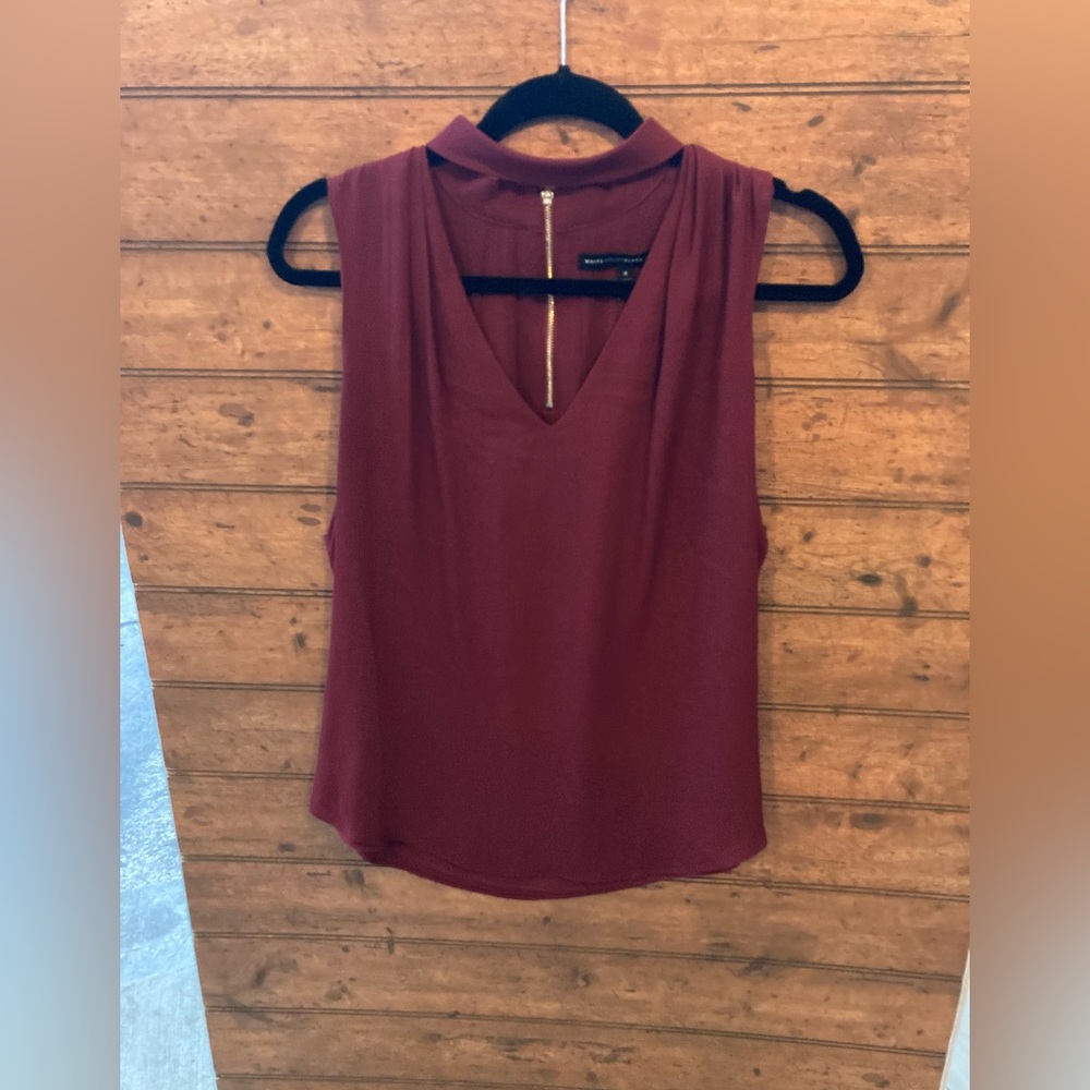 White House Black Market sleeveless blouse, size 8.